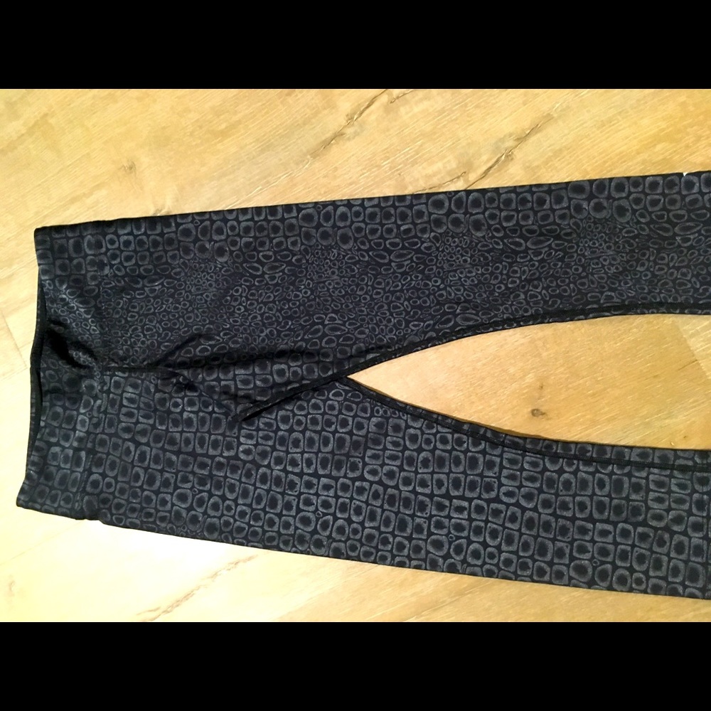 Small, metallic black crop yoga pant. Never worn